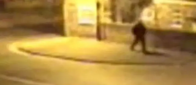 CCTV of man in alley