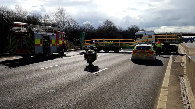 The jack-knifed lorry