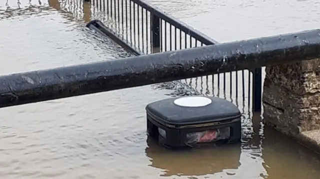 A bin almost under water in Upton upon Severn, Worcestershire