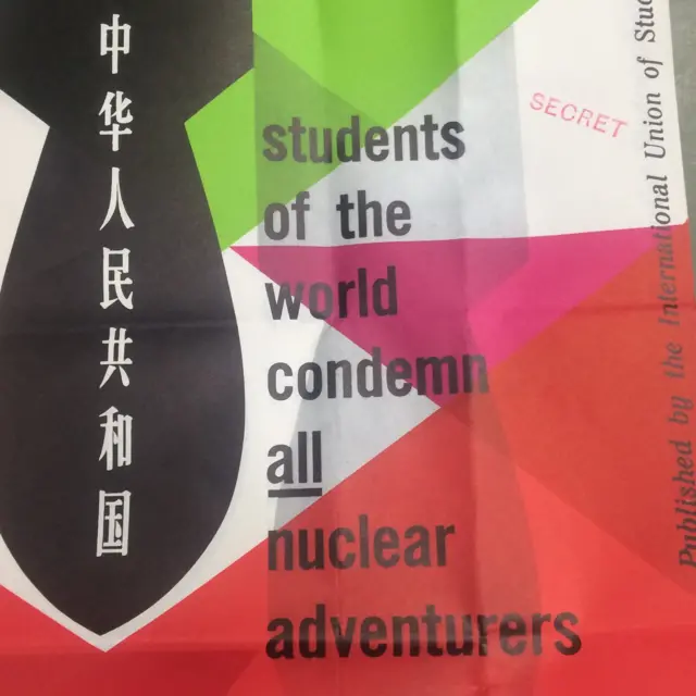 A poster with an image of a nuclear warhead with the caption "students of the world condemn all nuclear weapons".