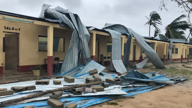 Iron roofs are seen torn off the top of a public building, Beira, Mozambique