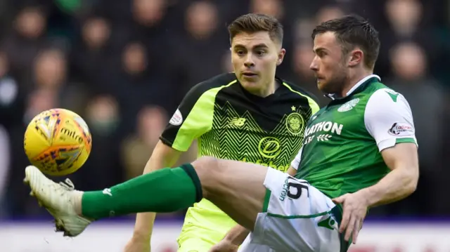 Lewis Stevenson clears from Celtic winger James Forrest