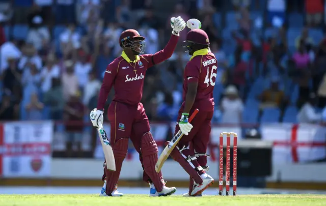 West Indies batsmen celebrate winning