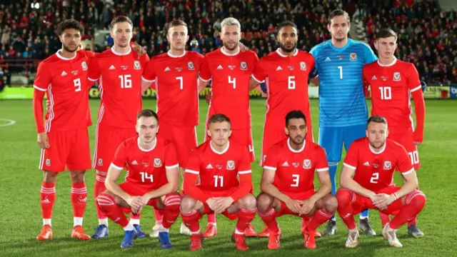 Wales players pose for a team photo before kick-off