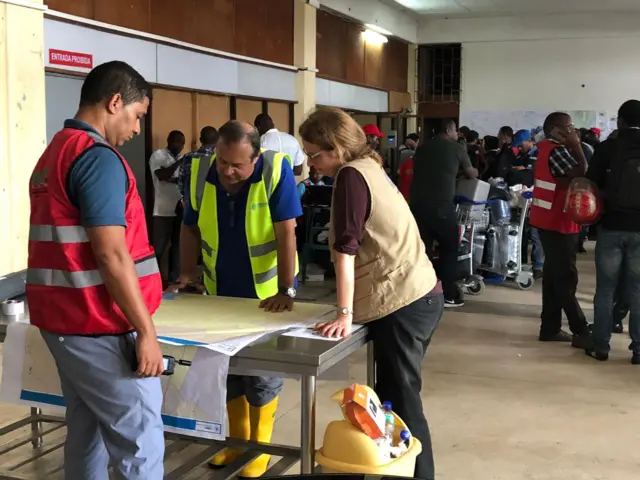 People looking at a table