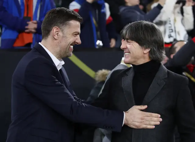 Mladen Krstajic, Head Coach of Serbia and Joachim Low, Head Coach of Germany