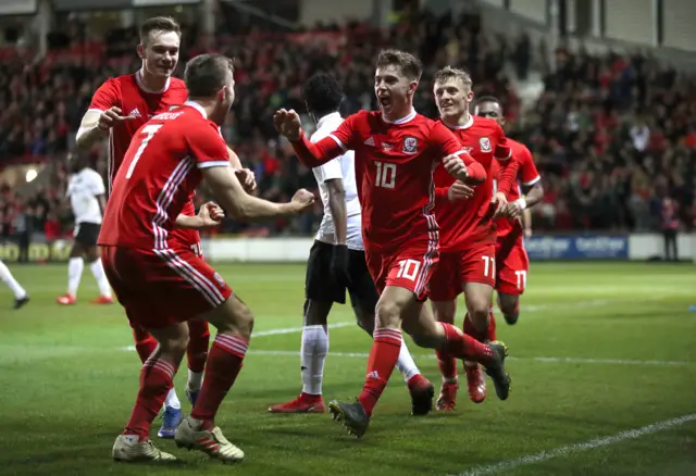 Wales' Ben Woodburn celebrates