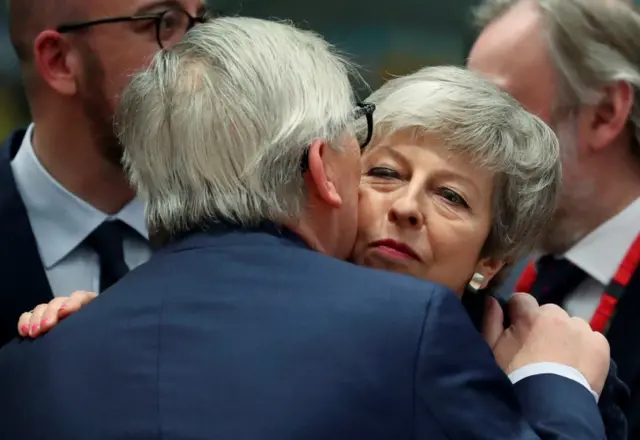 Jean Claude Juncker and Theresa May