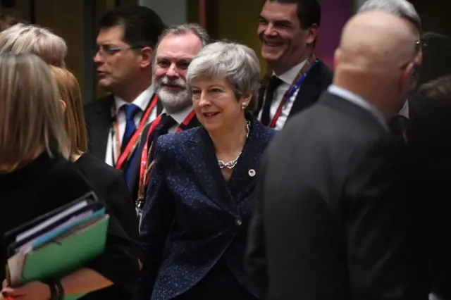 Theresa May arrives at the meeting of EU leaders