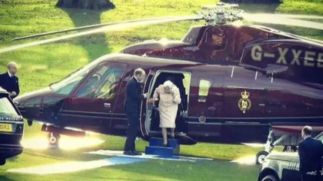 The Queen leaving a helicopter at Chatsworth House