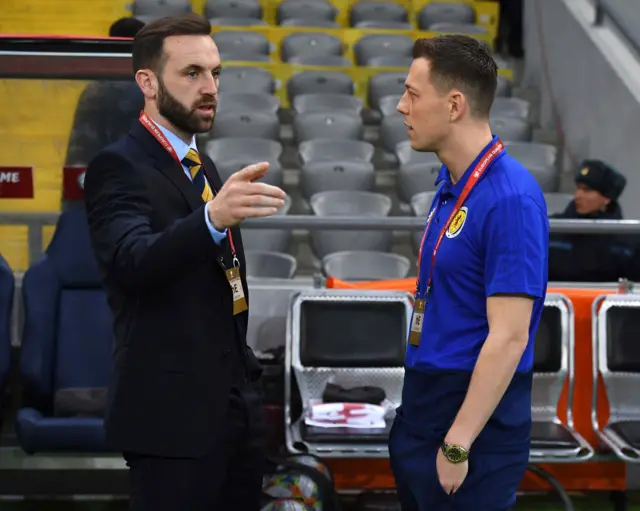 Assistant coach James McFadden with words for Scotland captain Callum McGregor