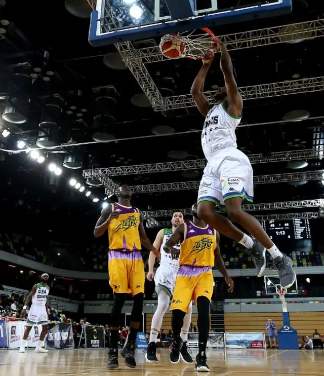 Willie Clayton of Manchester Giants dunks the basketball during the BBL Trophy Semi Final 2nd leg
