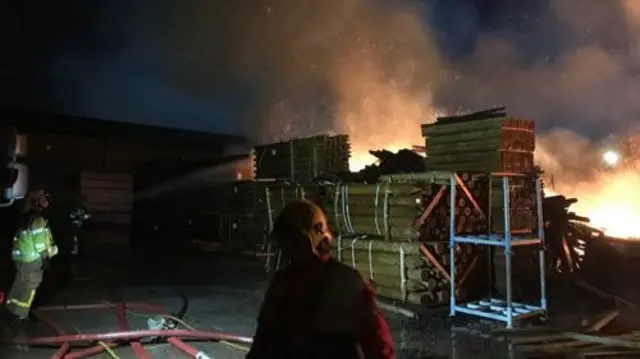 Fire at timber yard in Bryn
