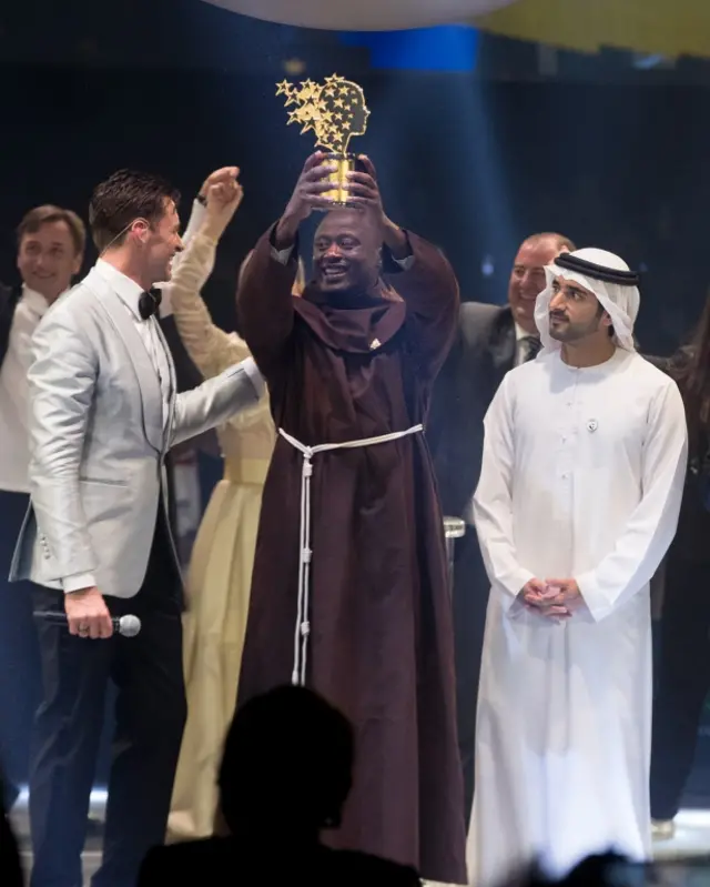 Varkey Foundation handout photo of Peter Tabichi, a maths and physics teacher from Kenya, after he was awarded the Varkey Foundation Global Teacher Prize at a ceremony in Dubai hosted by Hollywood star Hugh Jackman.