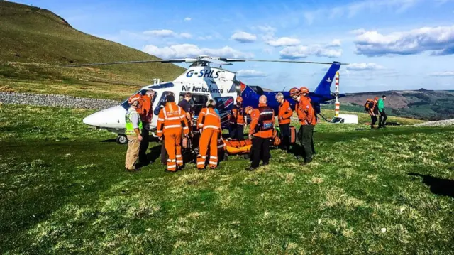 Casualty being put into the air ambulance