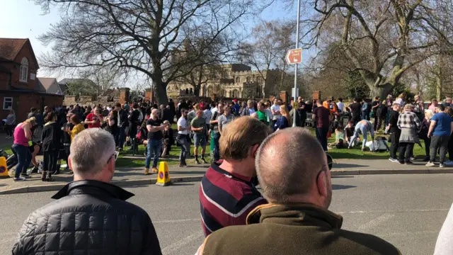 Fans gather along Keith Flint funeral procession route.