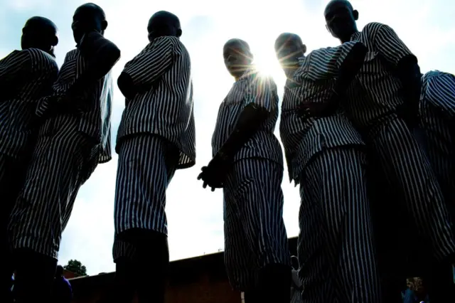 Prisoners silhoutted