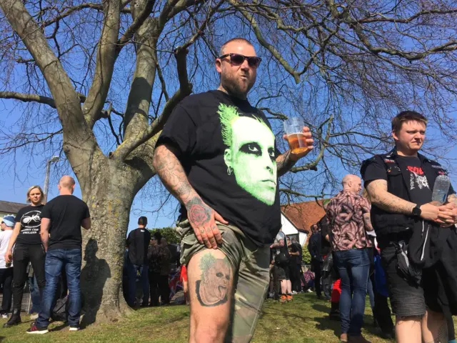 Man with Keith Flint tattoo.