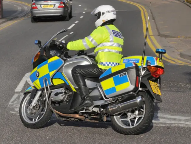 Police officer on motorbike