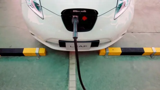 An electric car being charged