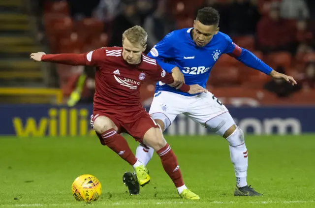 Gary Mackay-Steven battles Rangers' James Tavernier during the last match between the sides