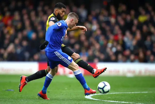 Jamie Vardy of Leicester City scores his sides first goal during the Premier League match between Watford FC and Leicester City