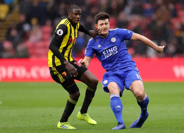 Harry Maguire of Leicester City and Abdoulaye Doucoure of Watford