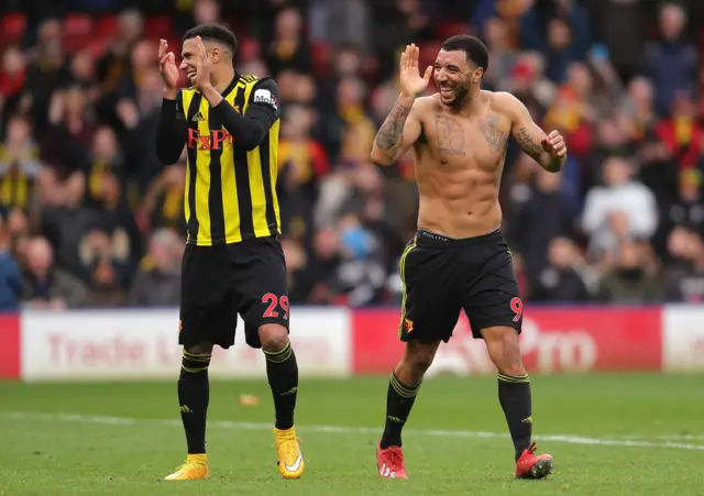 Troy Deeney of Watford and Etienne Capoue of Watford celebrate victory during the Premier League match between Watford FC and Leicester City