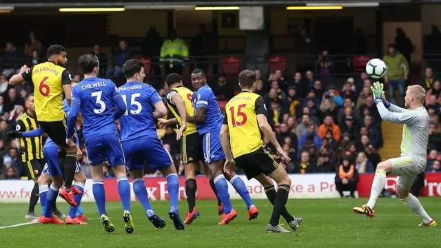 Troy Deeney glances Watford infront against Leicester