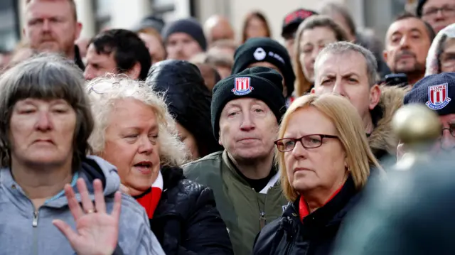 People gather outside the church for the funeral of former England World Cup winning goalkeeper Gordon Banks