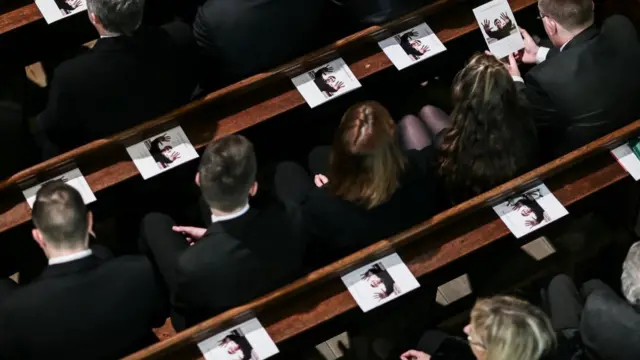 Mourners inside Stoke Minster