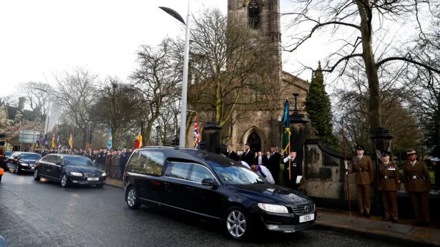 Funeral cortege arrives