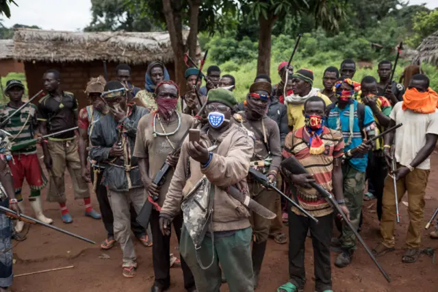 Anti-Balaka combattants patrol in the parish of Gambo, southeastern Central African Republic