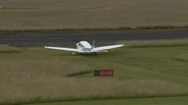 A plane on the airfield