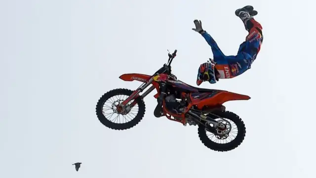 A freestyle motocross rider