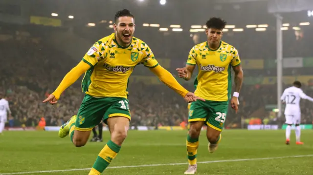 Emi Buendia celebrates