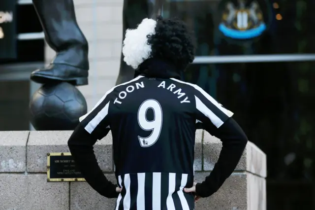 A Newcastle fan outside St James' Park