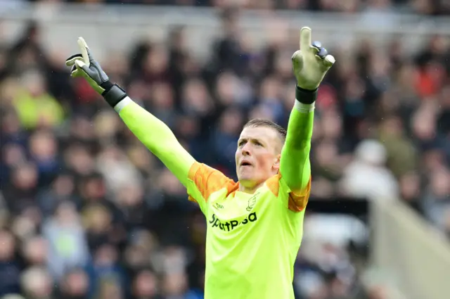 Everton's Jordan Pickford celebrates saving Newcastle's Matt Ritchie's penalty