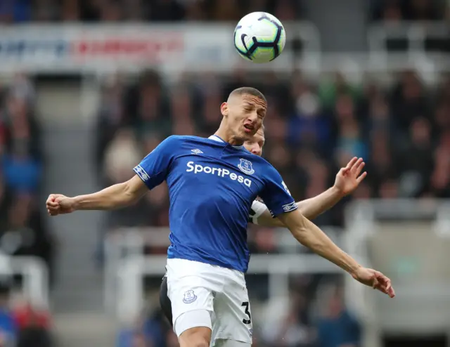 Everton's Richarlison heads the ball