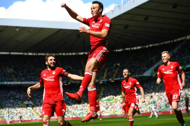 Andrew Considine celebrates scoring as Aberdeen beat Celtic 1-0 at Celtic Park on the final day of last season