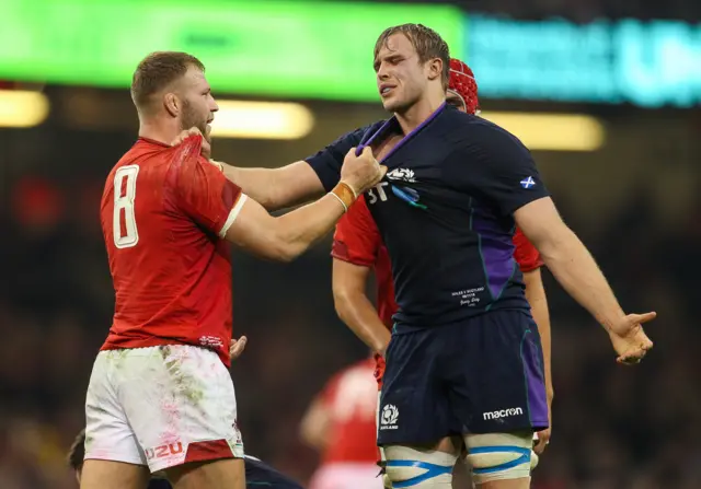 Ross Moriarty of Wales and Scotland's Jonny Gray square up