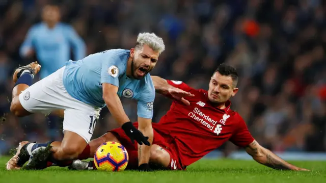 Sergio Aguero and Dejan Lovren