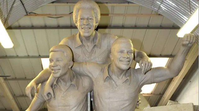 Clay model of statue of Laurie Cunningham, Brendon Batson and Cyrille Regis