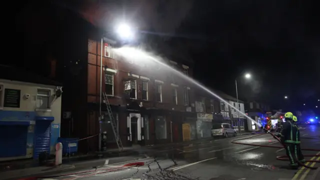 Firefighters at the pub fire