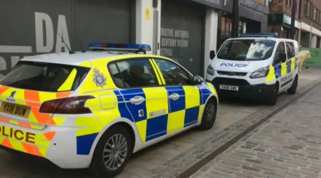 Police outside a Hull antiques shop