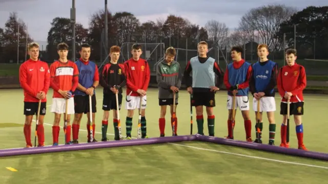 Hockey players with some of the pipes at Sandbach School