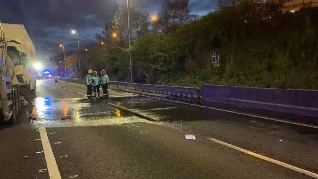 The liquid on the carriageway