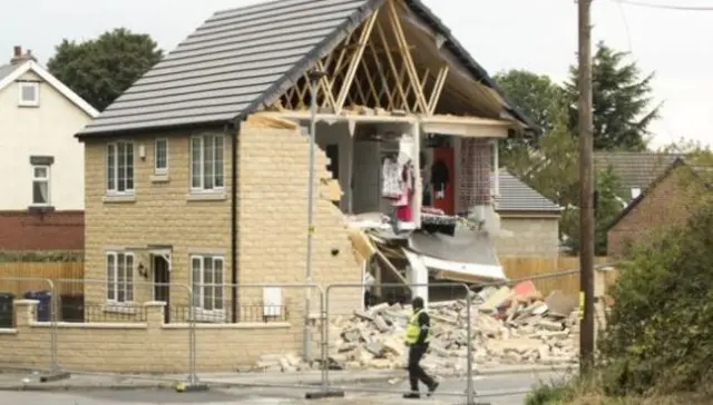 House hit by lorry