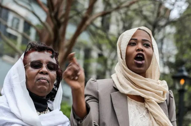 Lubaba Dahab protests outside Embassy of the Republic of the Sudan in Washington, US, April 11, 2019