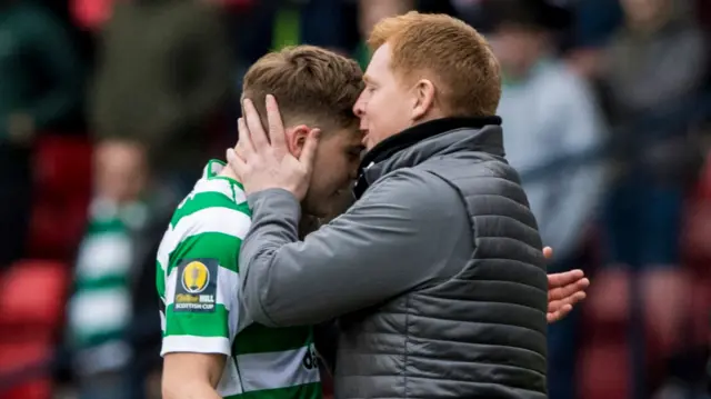 Celtic's James Forrest and Neil Lennon celebrate